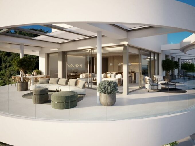Circular penthouse terrace with glass railing at The View Marbella III