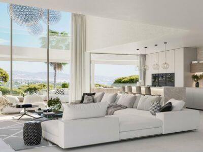Open living room and kitchen with large windows and mountain views at The Sky Marbella, Benahavís